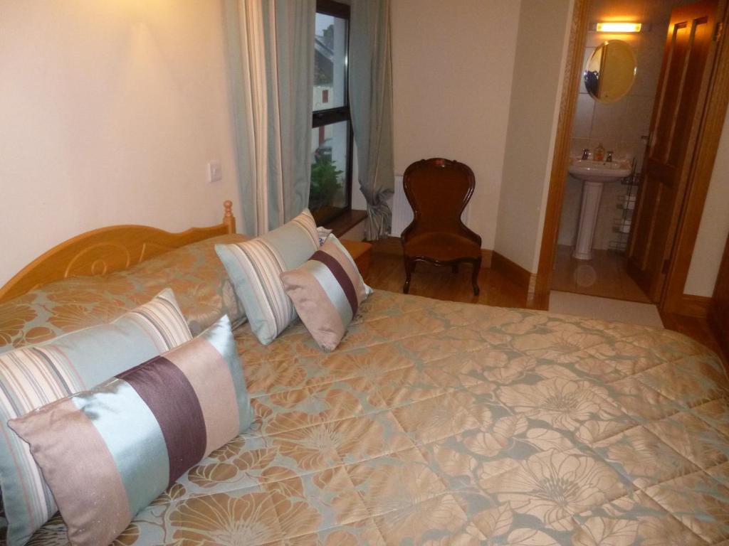 Postel nebo postele na pokoji v ubytování Ben View Guesthouse
