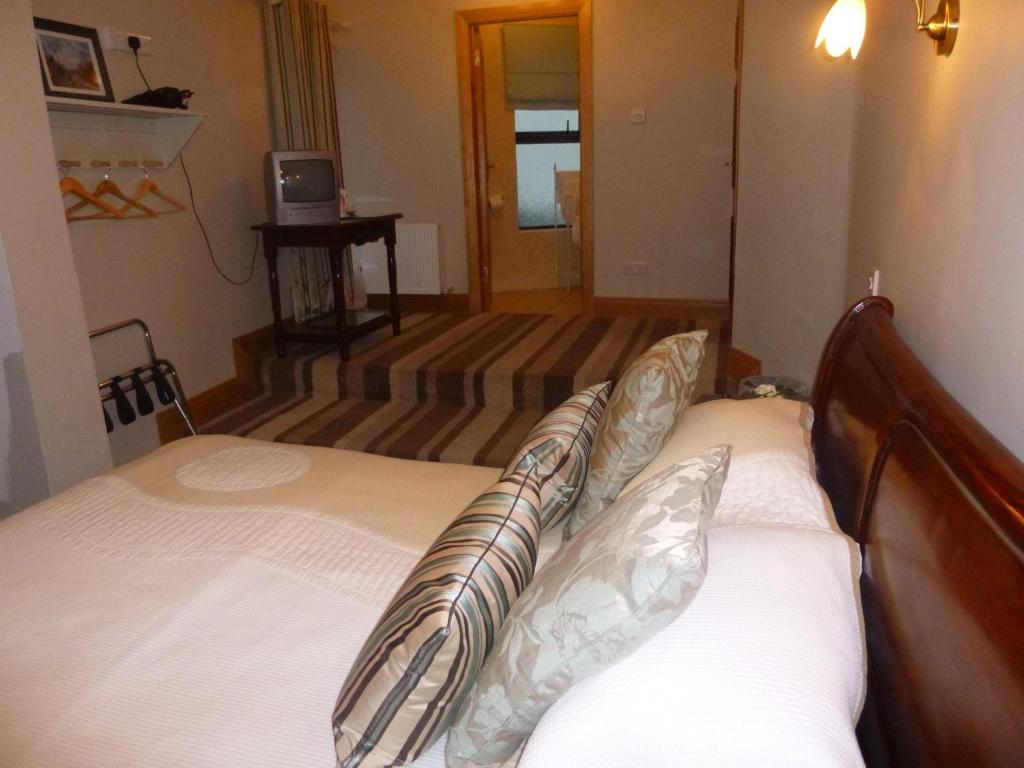 Postel nebo postele na pokoji v ubytování Ben View Guesthouse