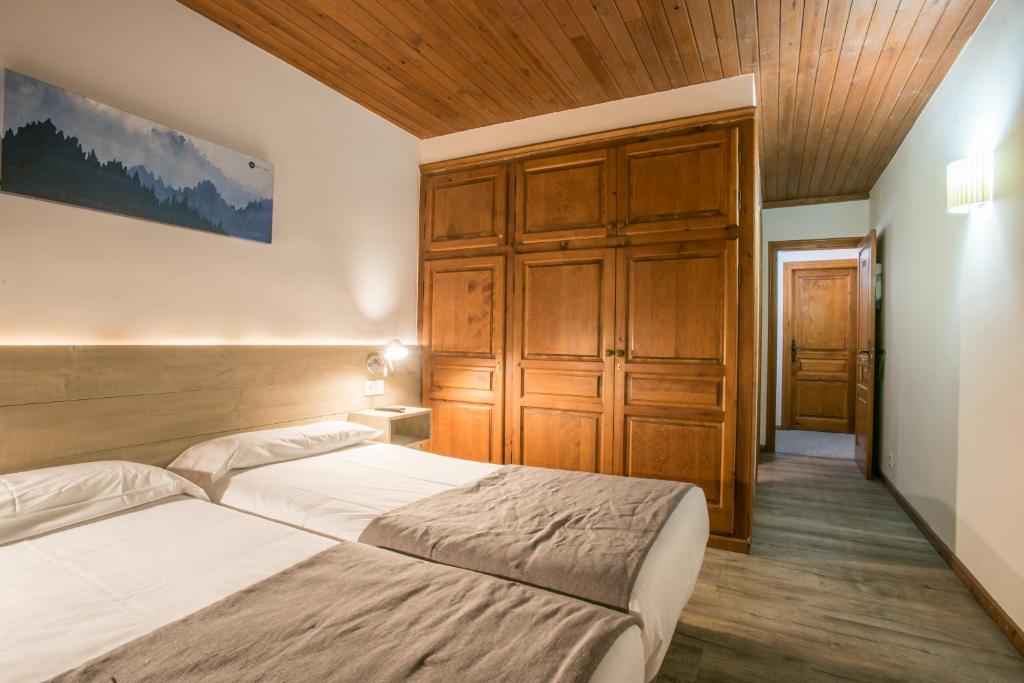 Posteľ alebo postele v izbe v ubytovaní Hotel SNÖ Mont Romies