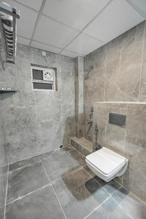 Koupelna v ubytování HOTEL SJ PRIDE