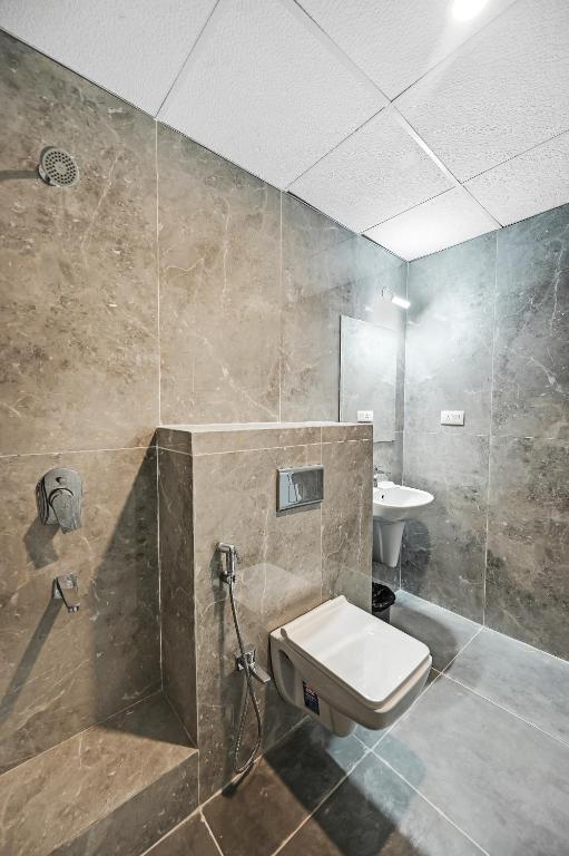 Koupelna v ubytování HOTEL SJ PRIDE