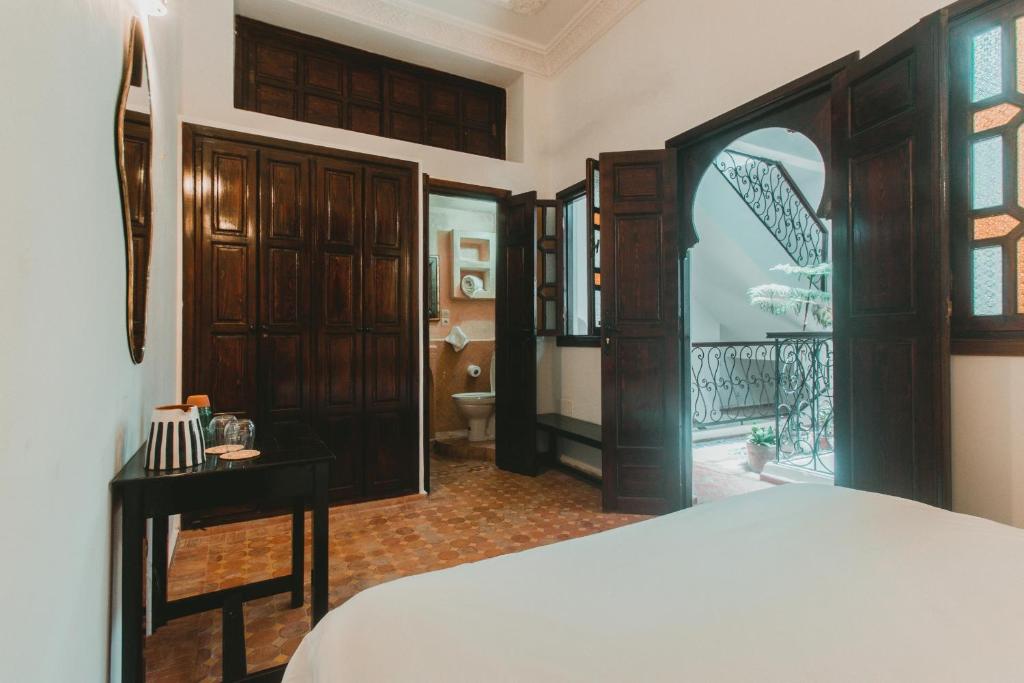 Postel nebo postele na pokoji v ubytování Noqta Space Coworking Coliving Space