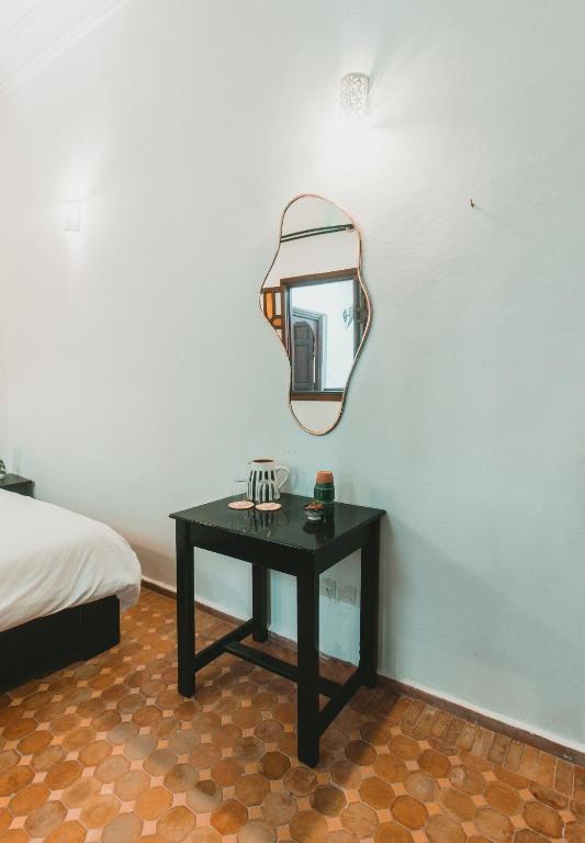 Postel nebo postele na pokoji v ubytování Noqta Space Coworking Coliving Space