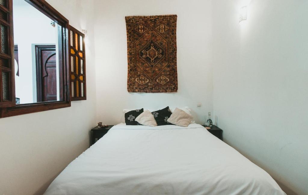 Postel nebo postele na pokoji v ubytování Noqta Space Coworking Coliving Space