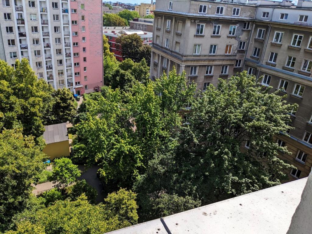 an overhead view of trees and buildings in a city at Comfortable and quiet flat in Central Warsaw in Warsaw