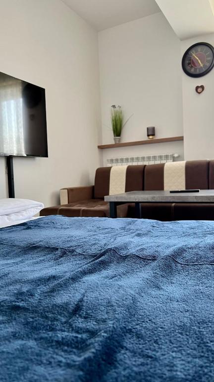 Televízia a/alebo spoločenská miestnosť v ubytovaní Apartament 36 Zator by Housine