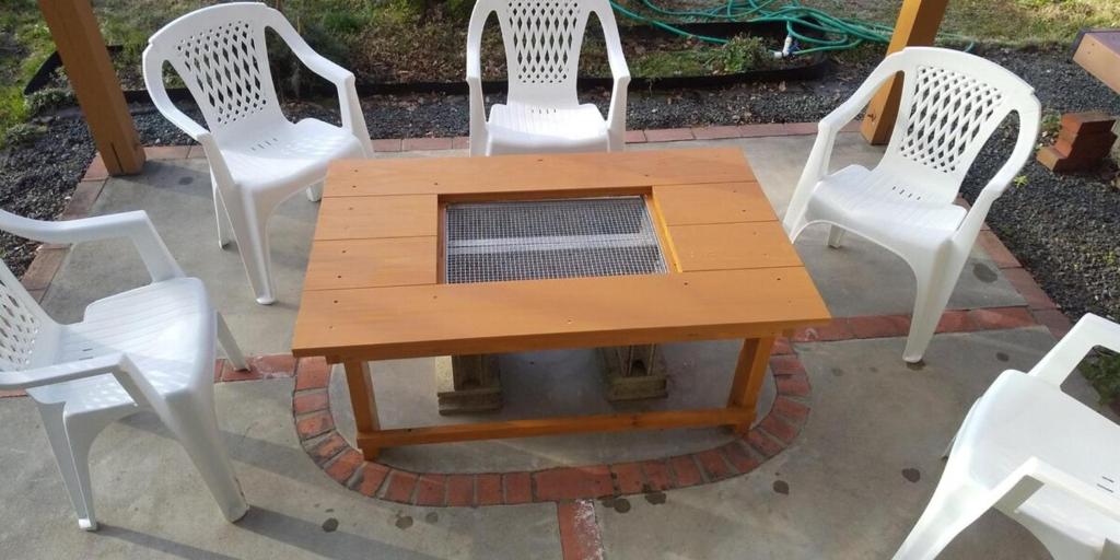 a wooden table with four white chairs around it at Minami Aso Guest House Hana hana - Vacation STAY 13316 in Takamori