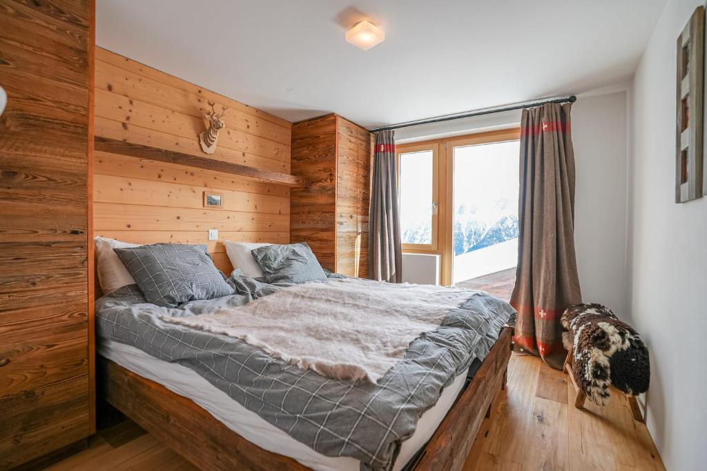 Postel nebo postele na pokoji v ubytování Chalet t'Alpa