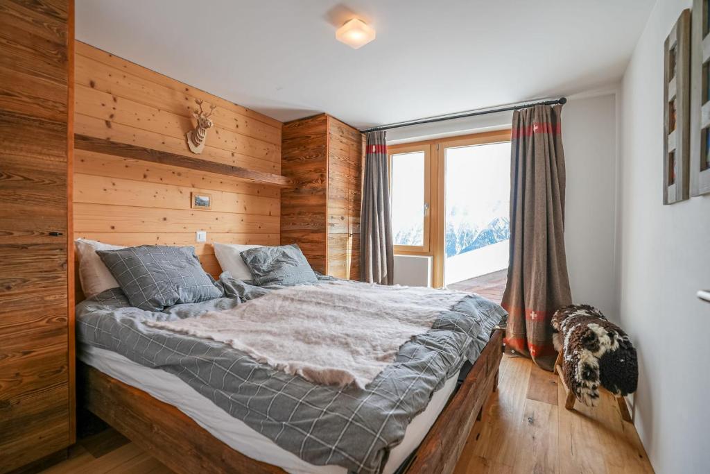 Postel nebo postele na pokoji v ubytování Chalet t'Alpa