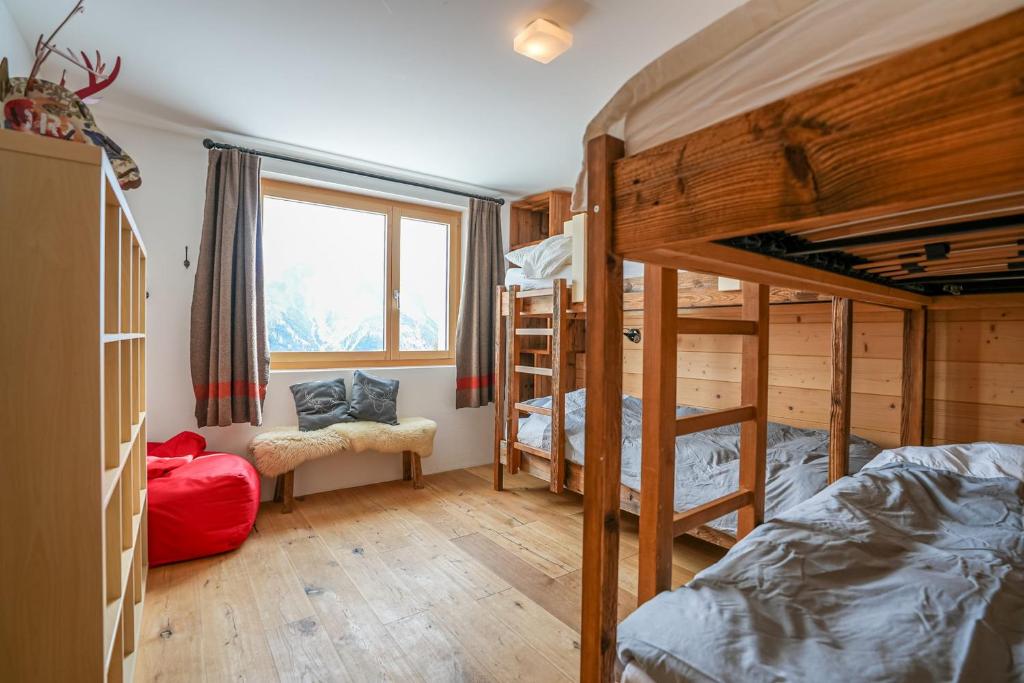 Postel nebo postele na pokoji v ubytování Chalet t'Alpa