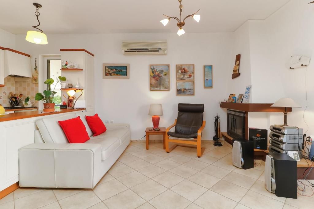 Posezení v ubytování Zoumperi Cute and Cozy close to airport and Rafina