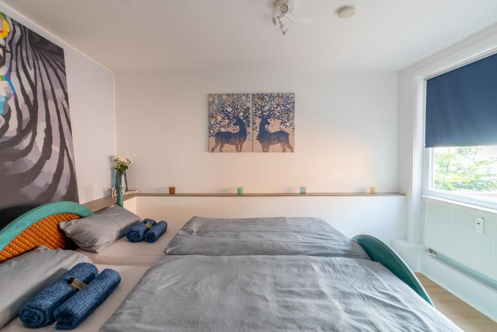 Postel nebo postele na pokoji v ubytování Akram Appartement I - Zentral und Ruhig
