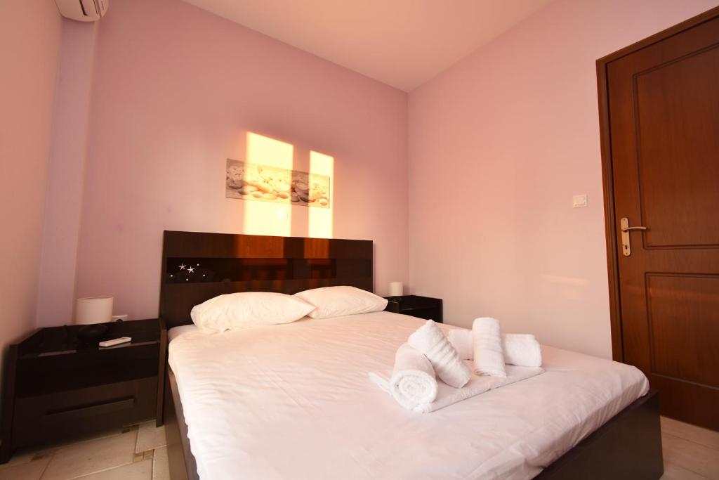 Posteľ alebo postele v izbe v ubytovaní Sea Side Pine Maisonette, Siviri