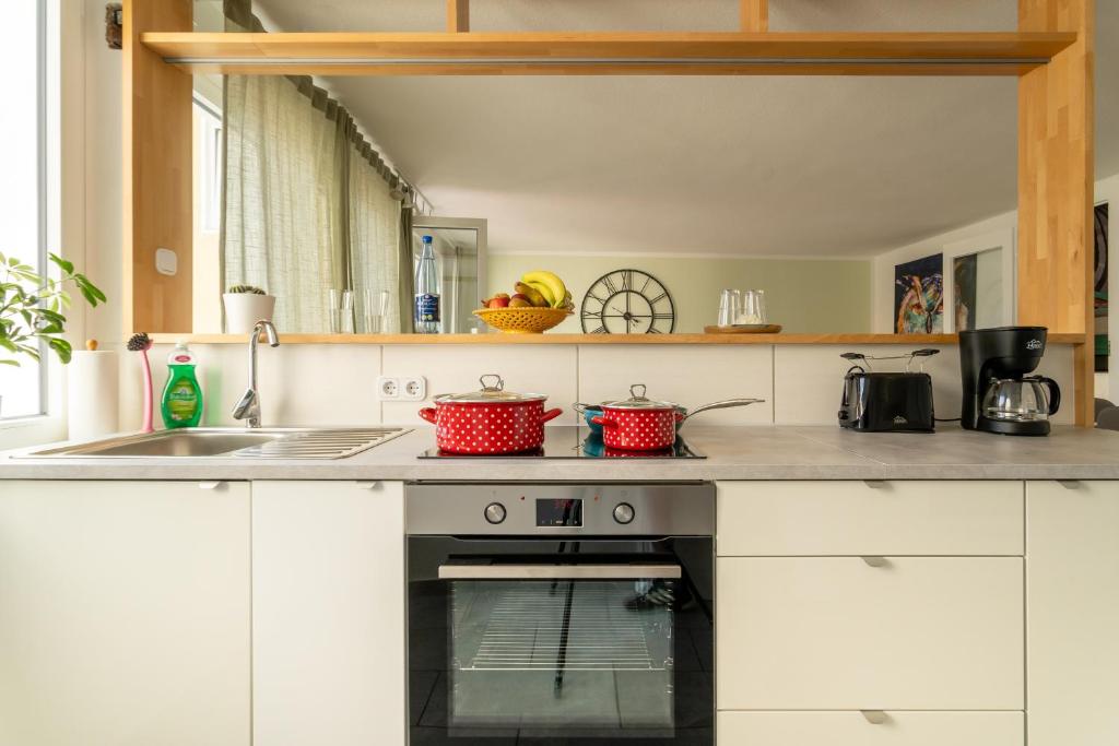 Kuchyň nebo kuchyňský kout v ubytování Akram Appartement I - Zentral und Ruhig