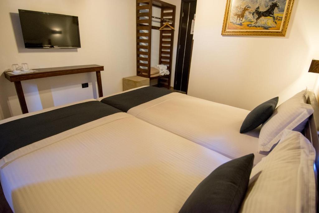 Posteľ alebo postele v izbe v ubytovaní KALE GUESTHOUSE