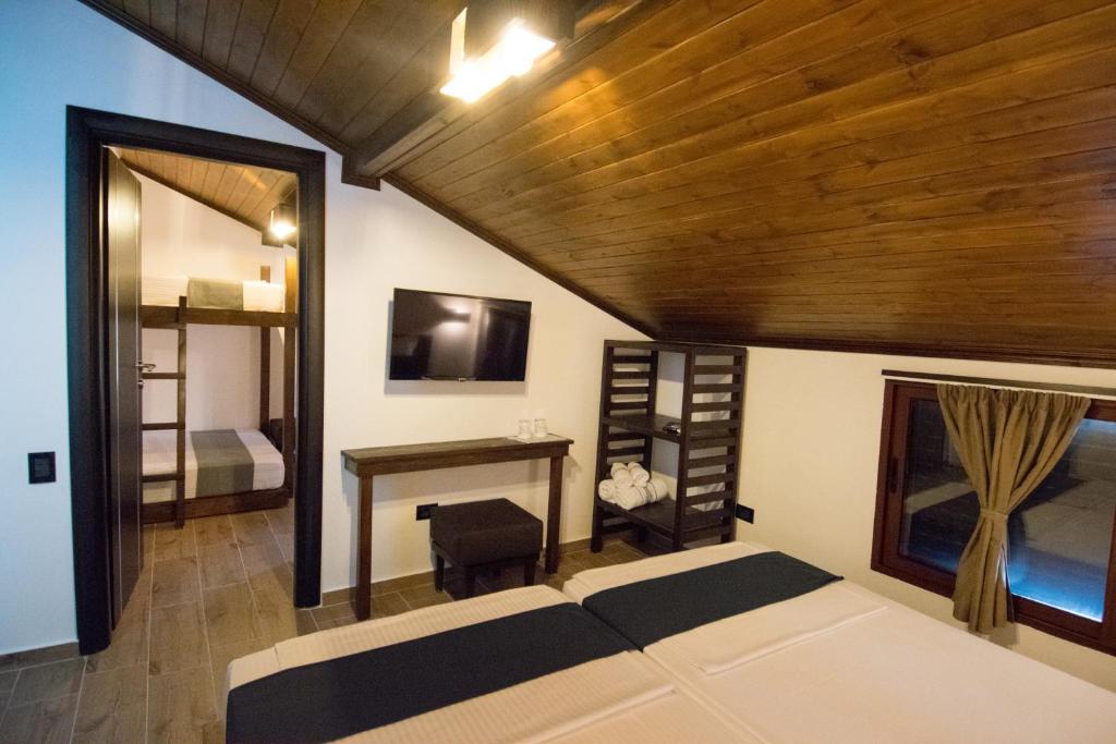 Postel nebo postele na pokoji v ubytování KALE GUESTHOUSE
