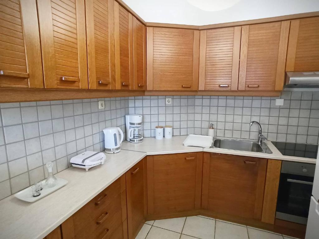 Kuchnia lub aneks kuchenny w obiekcie The Venetian Walls Cosy Apartments