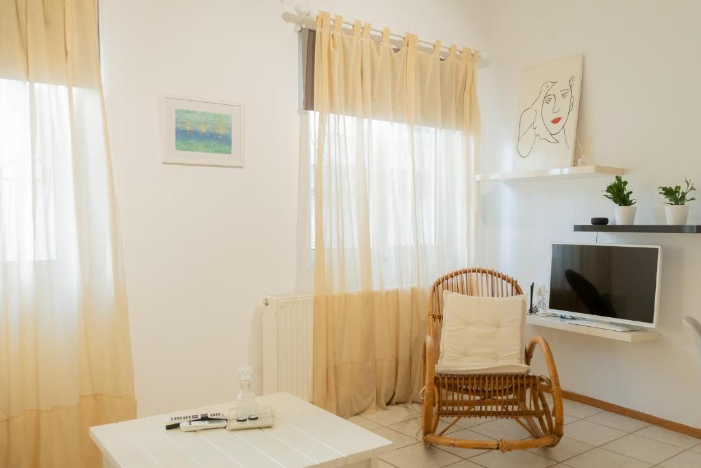 Telewizja i/lub zestaw kina domowego w obiekcie The Venetian Walls Cosy Apartments
