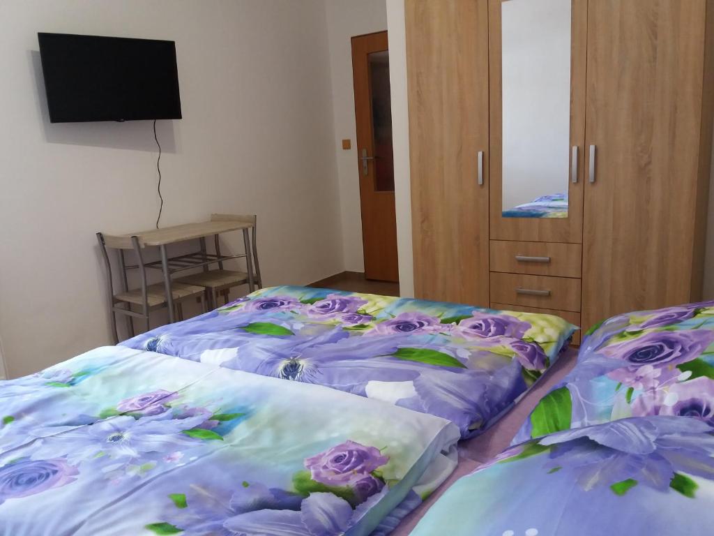 Postel nebo postele na pokoji v ubytování Apartmány Na Valše