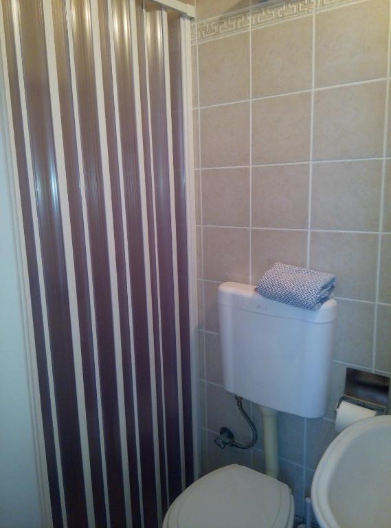 Koupelna v ubytování Hera Hotel