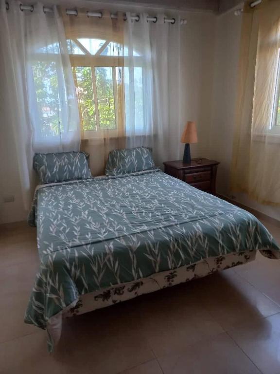 Postel nebo postele na pokoji v ubytování casa maria