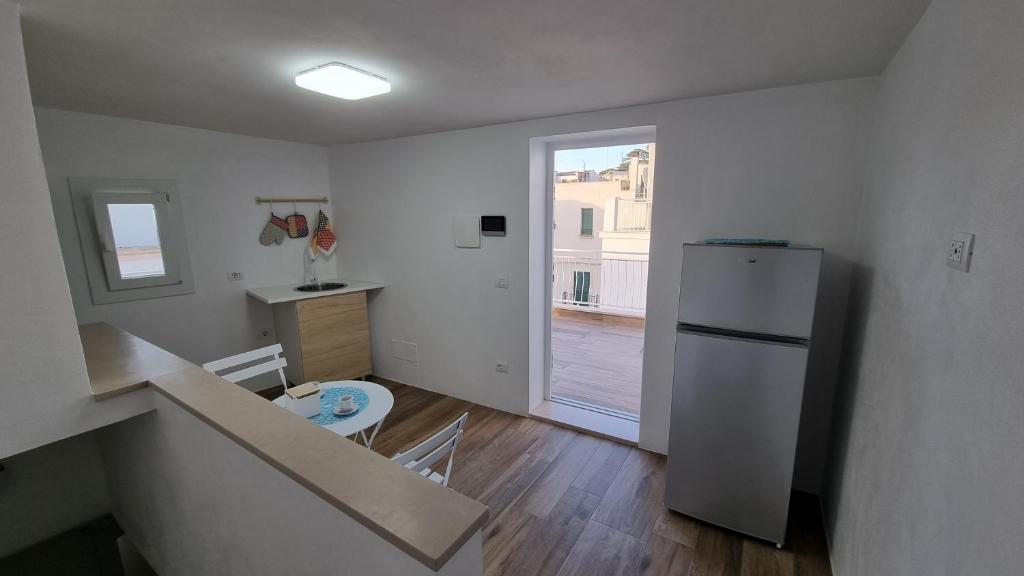 Kuchyň nebo kuchyňský kout v ubytování Casa Apula