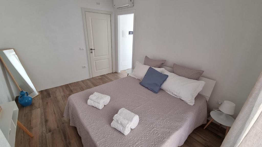 Postel nebo postele na pokoji v ubytování Casa Apula