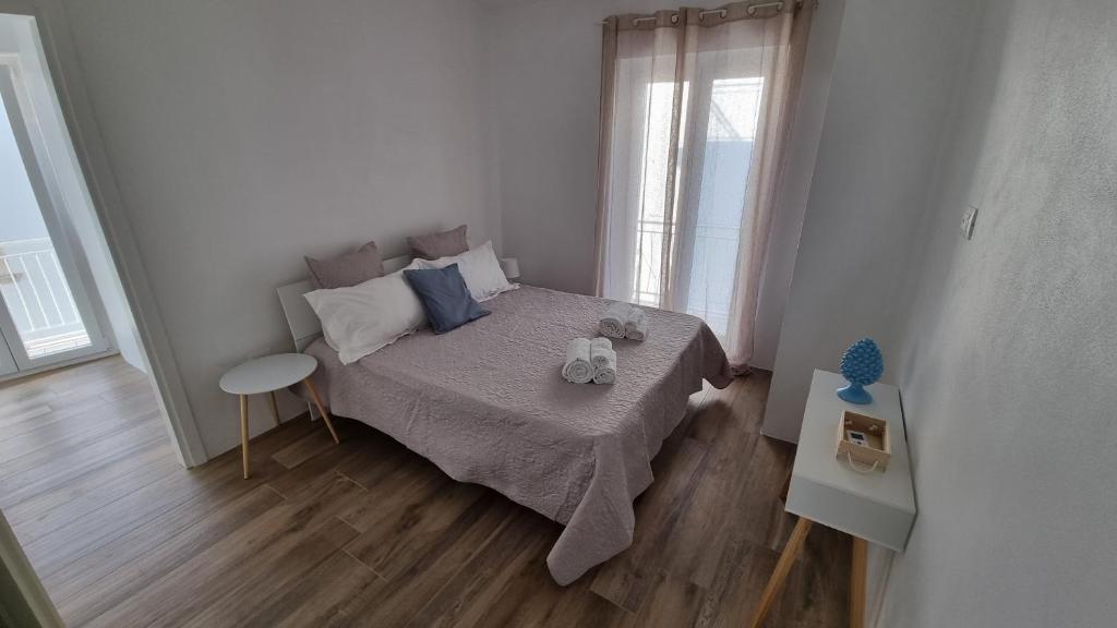 Postel nebo postele na pokoji v ubytování Casa Apula