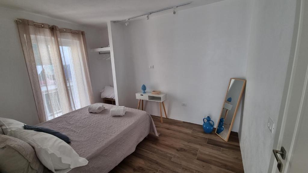 Postel nebo postele na pokoji v ubytování Casa Apula