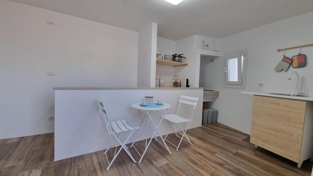 Kuchyň nebo kuchyňský kout v ubytování Casa Apula