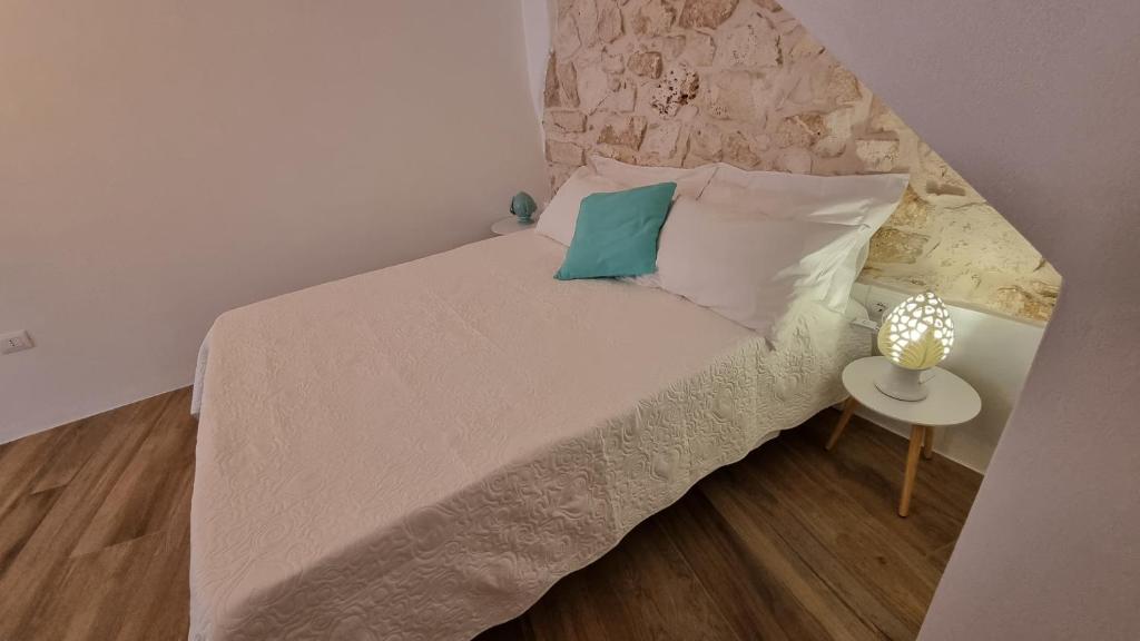 Postel nebo postele na pokoji v ubytování Casa Apula