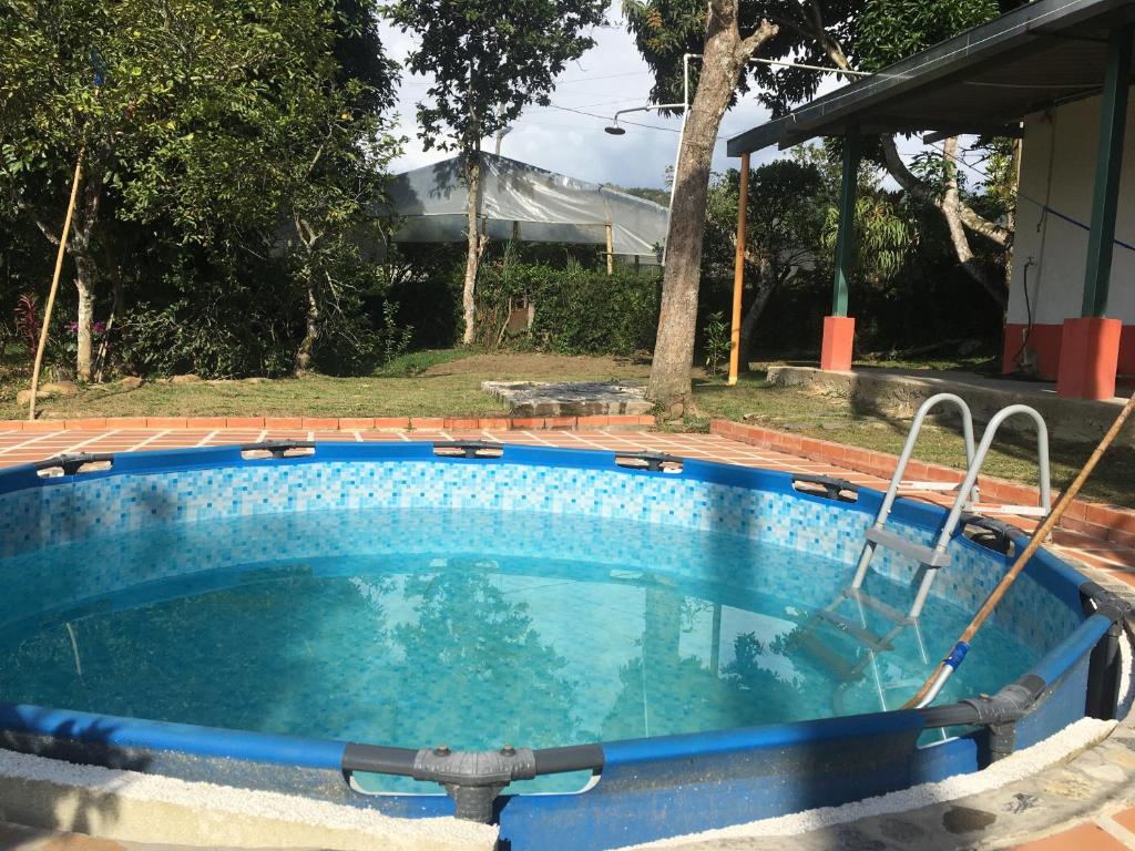 Bazén v ubytování Finca La Belleza-Villeta nebo v jeho okolí