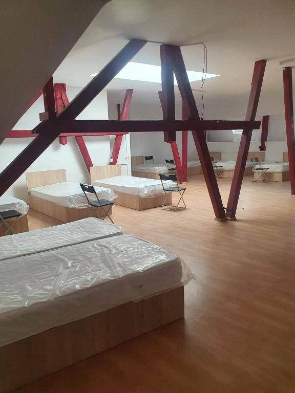 Postel nebo postele na pokoji v ubytování Cazare - Accommodation