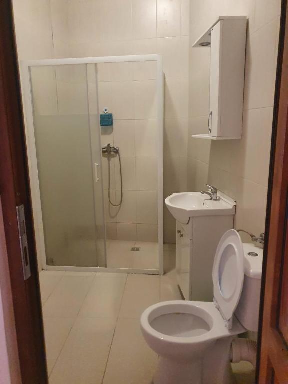 Koupelna v ubytování Cazare - Accommodation