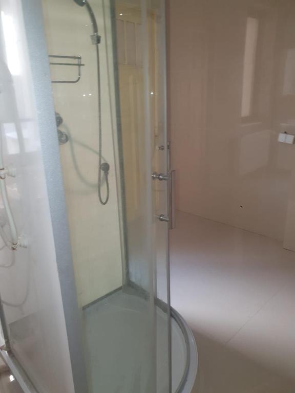 Koupelna v ubytování Cazare - Accommodation