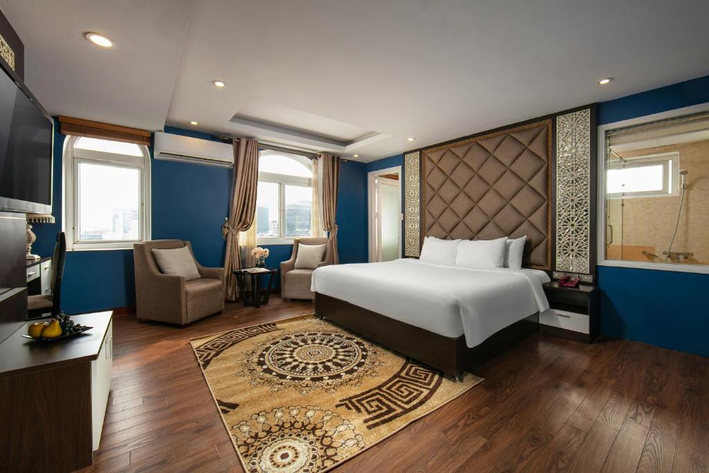 Postel nebo postele na pokoji v ubytování Hanoi 20 Hotel & Apartment