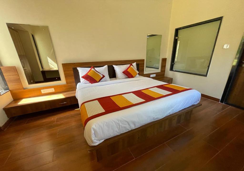 Postel nebo postele na pokoji v ubytování Las Cabanas Resort
