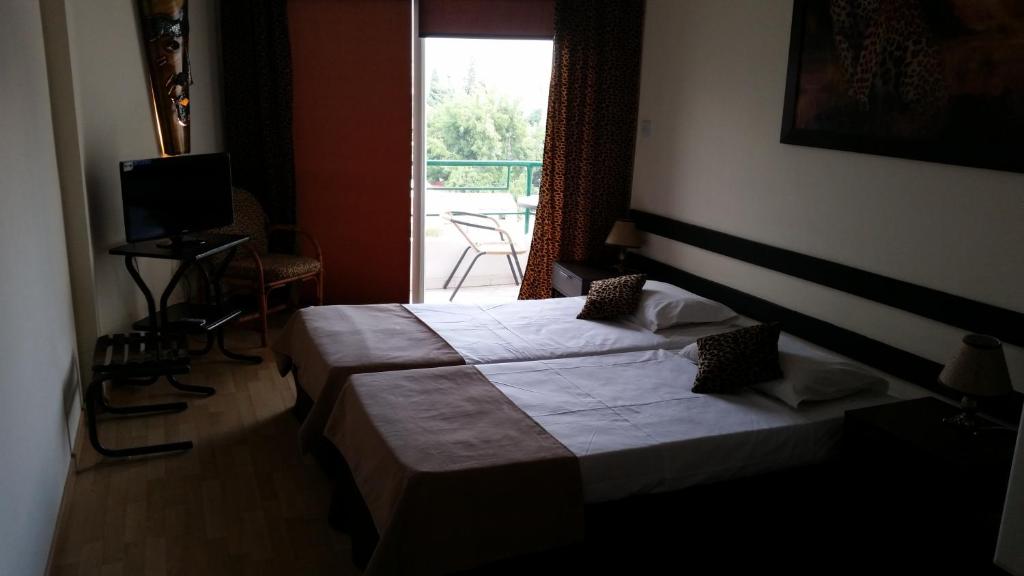 Postel nebo postele na pokoji v ubytování Sylva Hotel