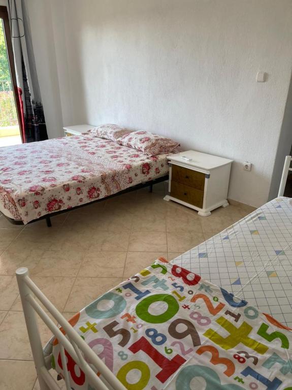 Postel nebo postele na pokoji v ubytování George Stone House