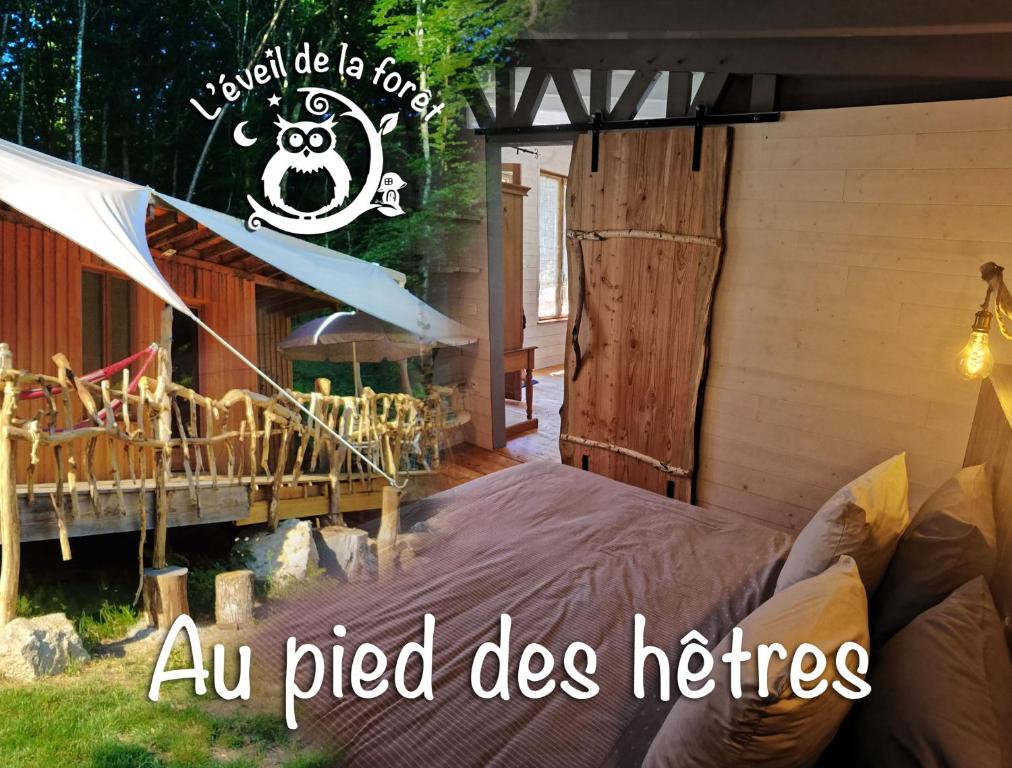 a room with a bed with a sign that reads an pitched dies heroes at Gîte nature Au pied des hêtres in Vitrac-sur-Montane