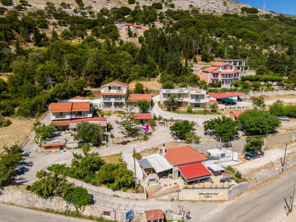 an aerial view of a village with houses at Minas Apartments in Divarata