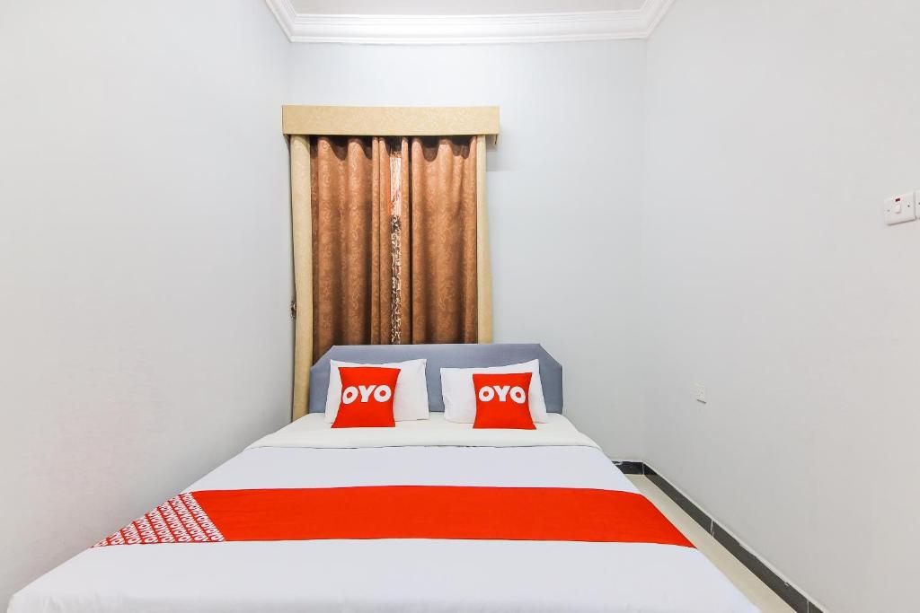 Postel nebo postele na pokoji v ubytování Super OYO 110 Ras Al Hadd Guest House