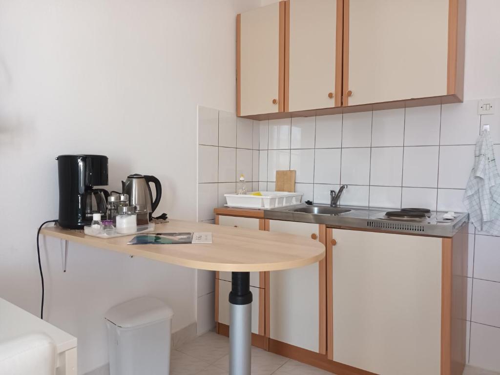 Kuchyň nebo kuchyňský kout v ubytování Apartments Verica
