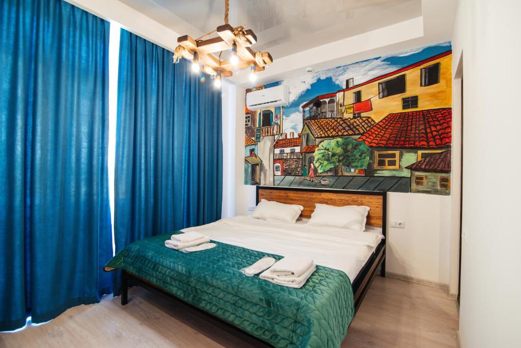 Postel nebo postele na pokoji v ubytování Hotel Boutique George