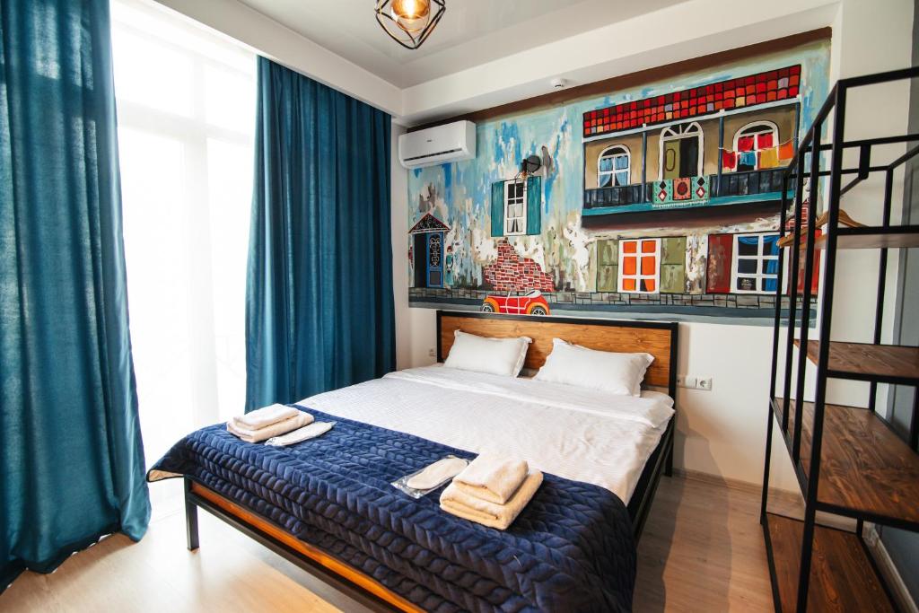 Postel nebo postele na pokoji v ubytování Hotel Boutique George