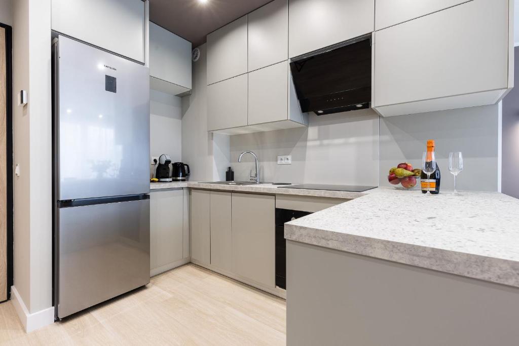 Kuchyňa alebo kuchynka v ubytovaní Apartament nr 5 Cetniewo Osada, Władysławowo, duży taras, parking podziemny