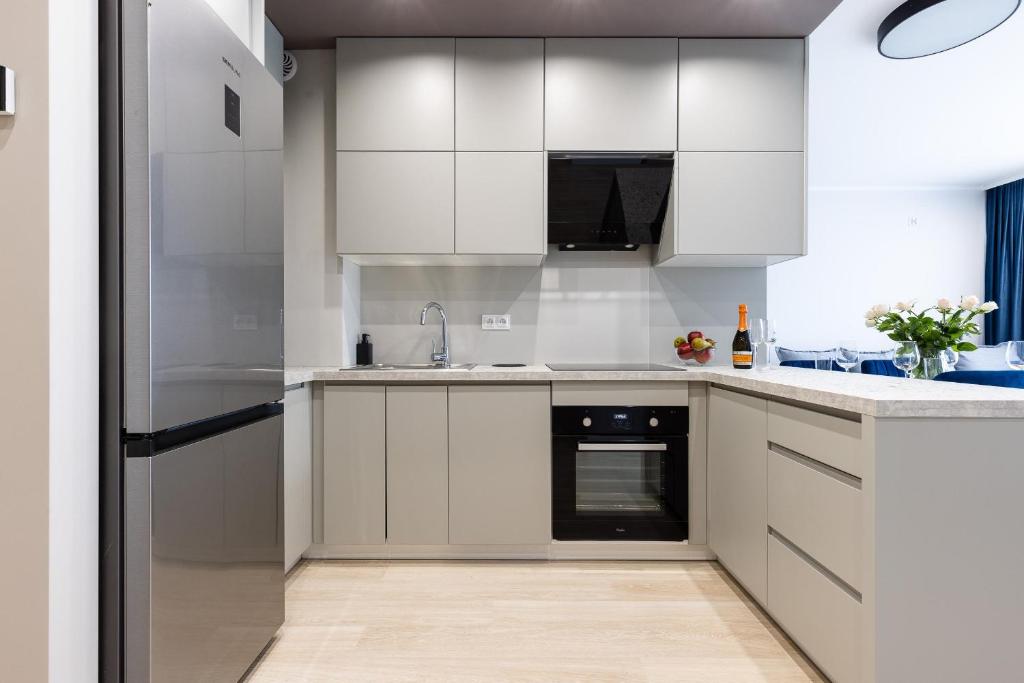 Kuchyňa alebo kuchynka v ubytovaní Apartament nr 5 Cetniewo Osada, Władysławowo, duży taras, parking podziemny