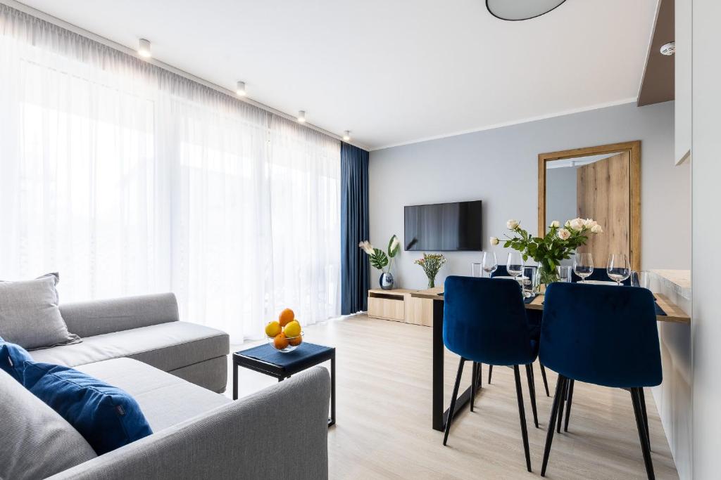 Televízia a/alebo spoločenská miestnosť v ubytovaní Apartament nr 5 Cetniewo Osada, Władysławowo, duży taras, parking podziemny
