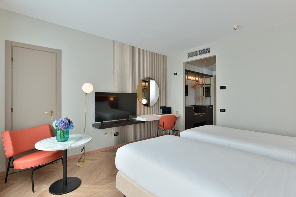 TV a/nebo společenská místnost v ubytování Agora' Palace Hotel