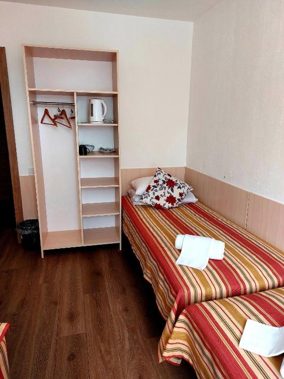 Postel nebo postele na pokoji v ubytování Vila Giruliai
